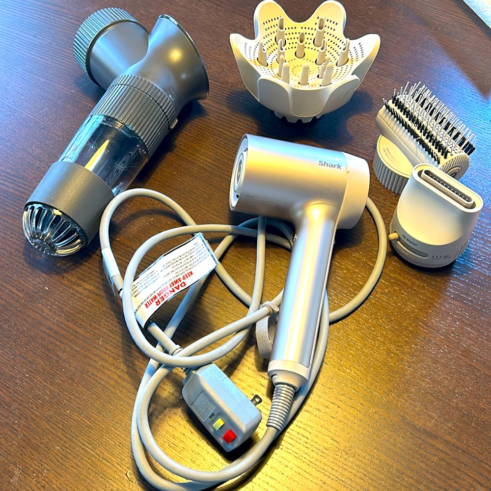 Shark Hyper Air IQ blow dryer with 4 attachments as shown. Hair dryer used twice